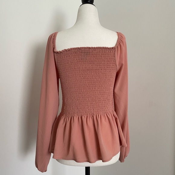 Pink shoulder cut peplum shirt - Picture 2 of 2